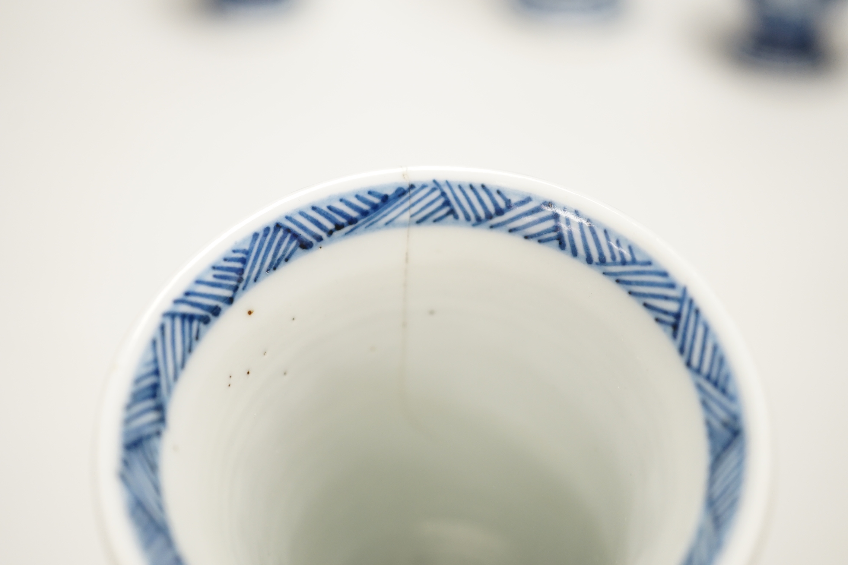 Four Chinese Kangxi period blue and white small vases, tallest 16cm high